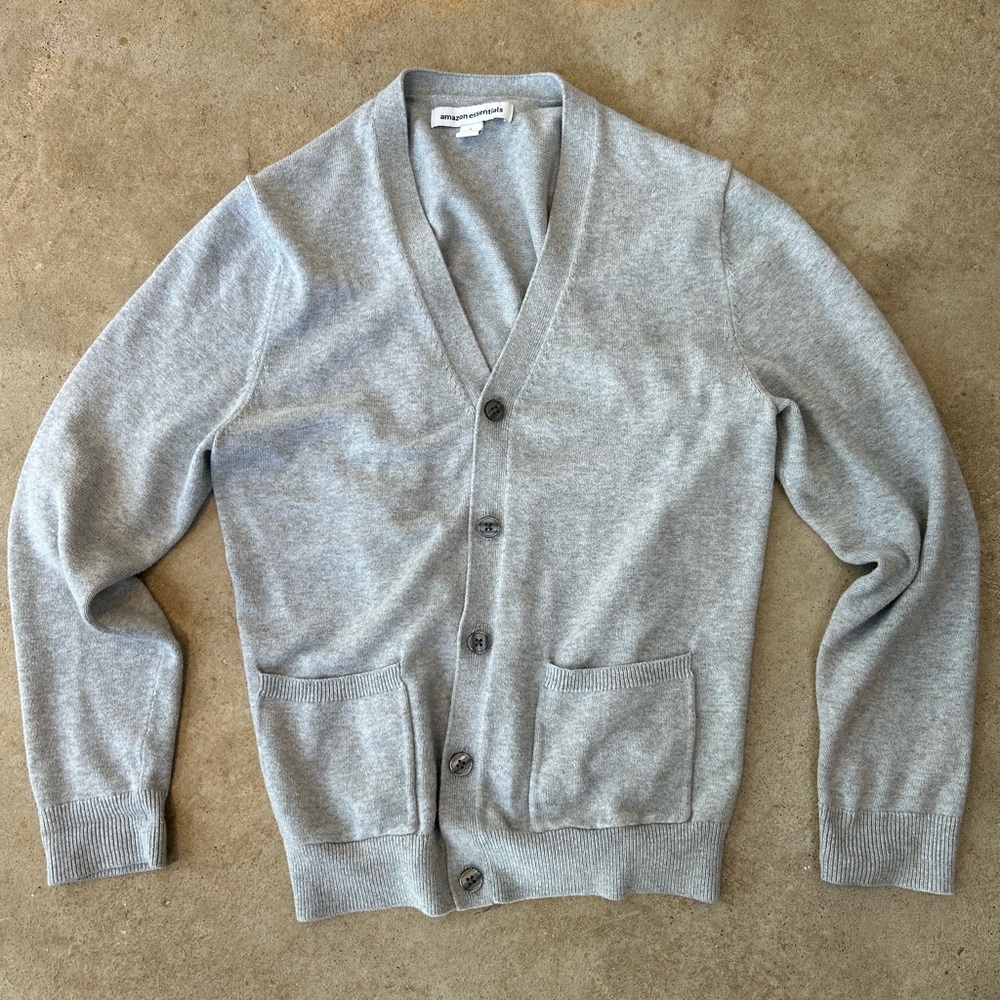 Light grey cardigan, like new, loose/relaxed fit.